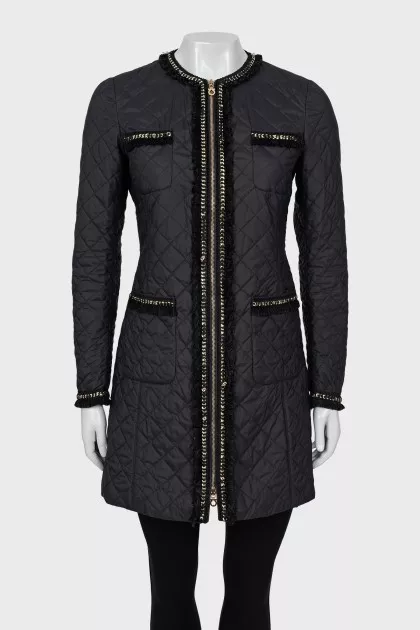 Quilted jacket decorated with fringe