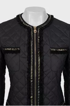 Quilted jacket decorated with fringe