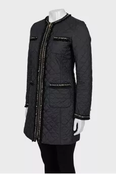Quilted jacket decorated with fringe