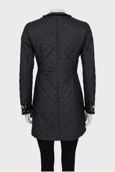 Quilted jacket decorated with fringe