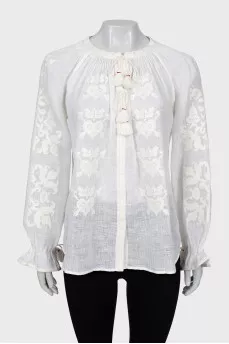 Linen blouse decorated with embroidery