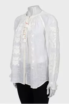Linen blouse decorated with embroidery
