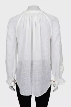 Linen blouse decorated with embroidery