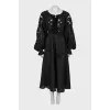 Linen dress decorated with perforation