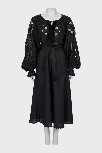 Linen dress decorated with perforation