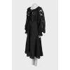 Linen dress decorated with perforation