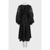 Linen dress decorated with perforation