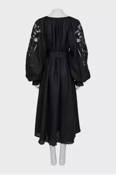Linen dress decorated with perforation