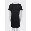 Black dress decorated with zippers