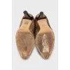 Gold colored snakeskin boots