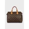Speedy bag with branded hardware