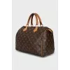 Speedy bag with branded hardware