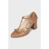 Patent leather shoes with bow and chain