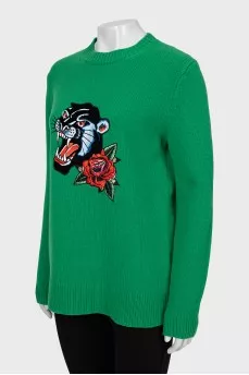 Knitted sweater with embroidery