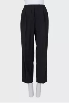 Straight black trousers with a mid-rise