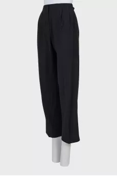 Straight black trousers with a mid-rise