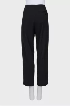 Straight black trousers with a mid-rise