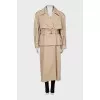 Trench coat with detachable sleeves and hem with tag