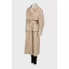 Trench coat with detachable sleeves and hem with tag