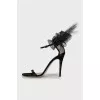 Suede sandals decorated with bows