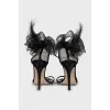 Suede sandals decorated with bows