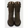 Suede boots decorated with straps