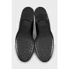 Black leather boots with textile inserts