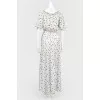 White dress in colored peas