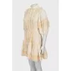 Beige dress decorated with lace