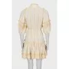 Beige dress decorated with lace