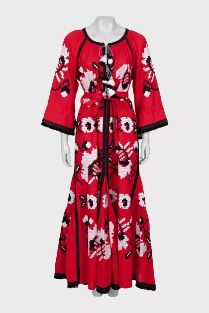 Dress with fringe decorated with embroidery
