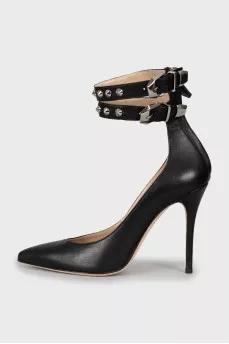 Leather shoes decorated with buckles and studs