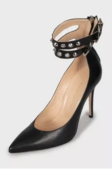 Leather shoes decorated with buckles and studs