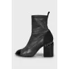 Ankle boots decorated with chain