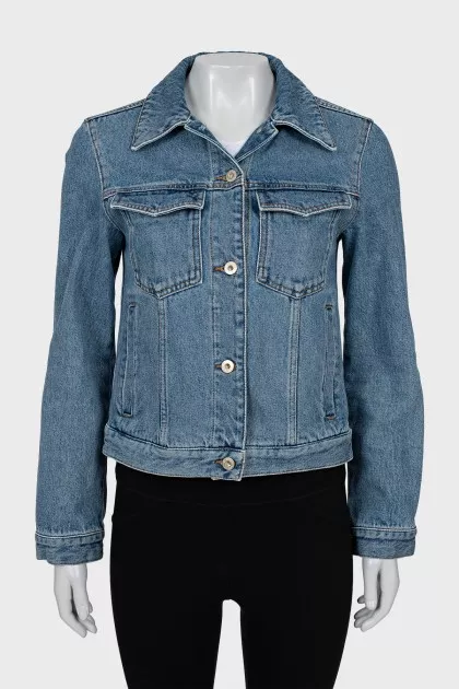 Denim jacket with decorated sleeves