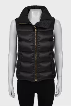 Black vest with gold fittings