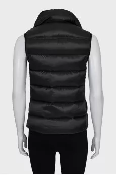 Black vest with gold fittings