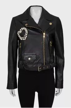 Leather jacket decorated with beads