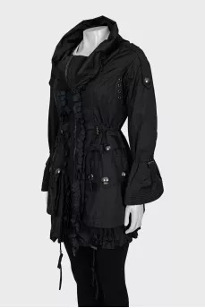 Coat with branded buttons
