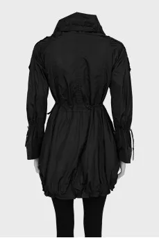 Coat with branded buttons