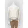Blouse with a transparent insert
