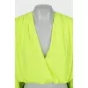 Short blouse decorated with drapery