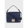 Leather bag with a flap in blue