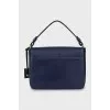 Leather bag with a flap in blue