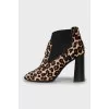 Animal print pony skin ankle boots