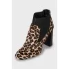 Animal print pony skin ankle boots