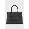 Leather bag with the brand's signature logo