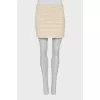 Knitted mini skirt with tag