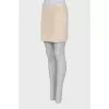 Knitted mini skirt with tag