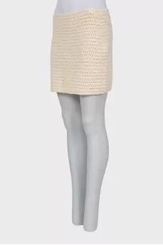 Knitted mini skirt with tag